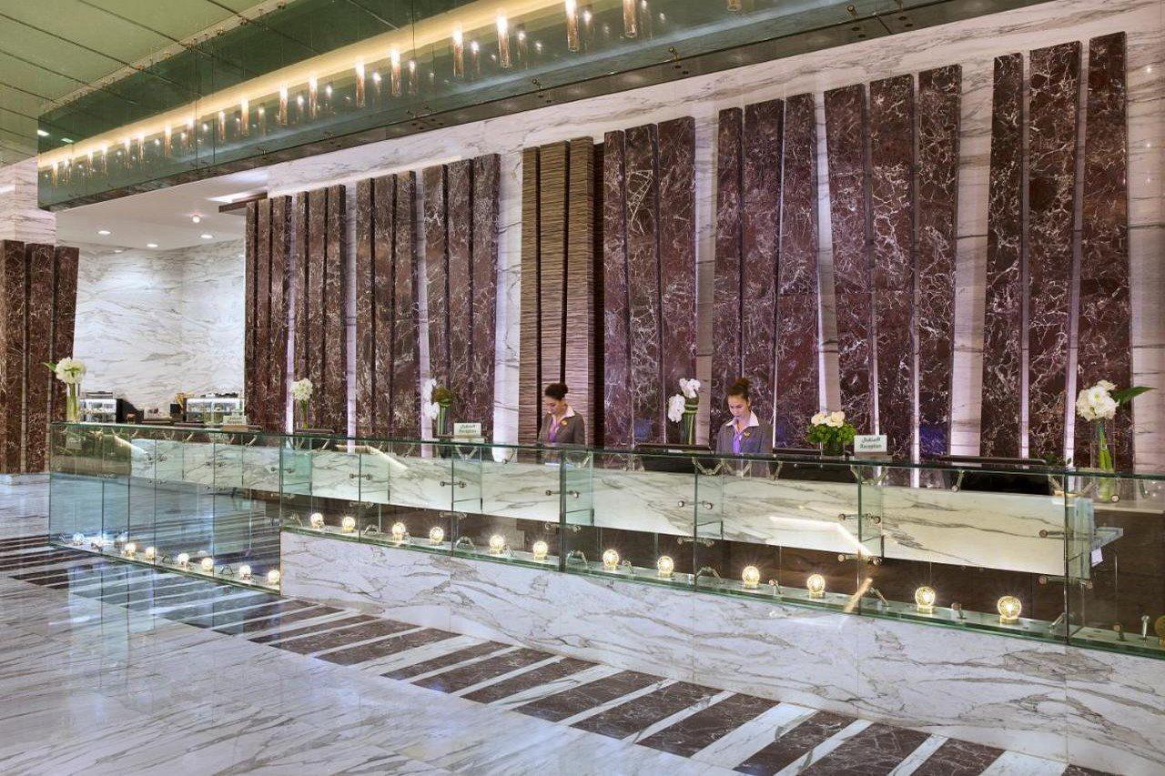 Atana Hotel Dubai Esterno foto Reception desk