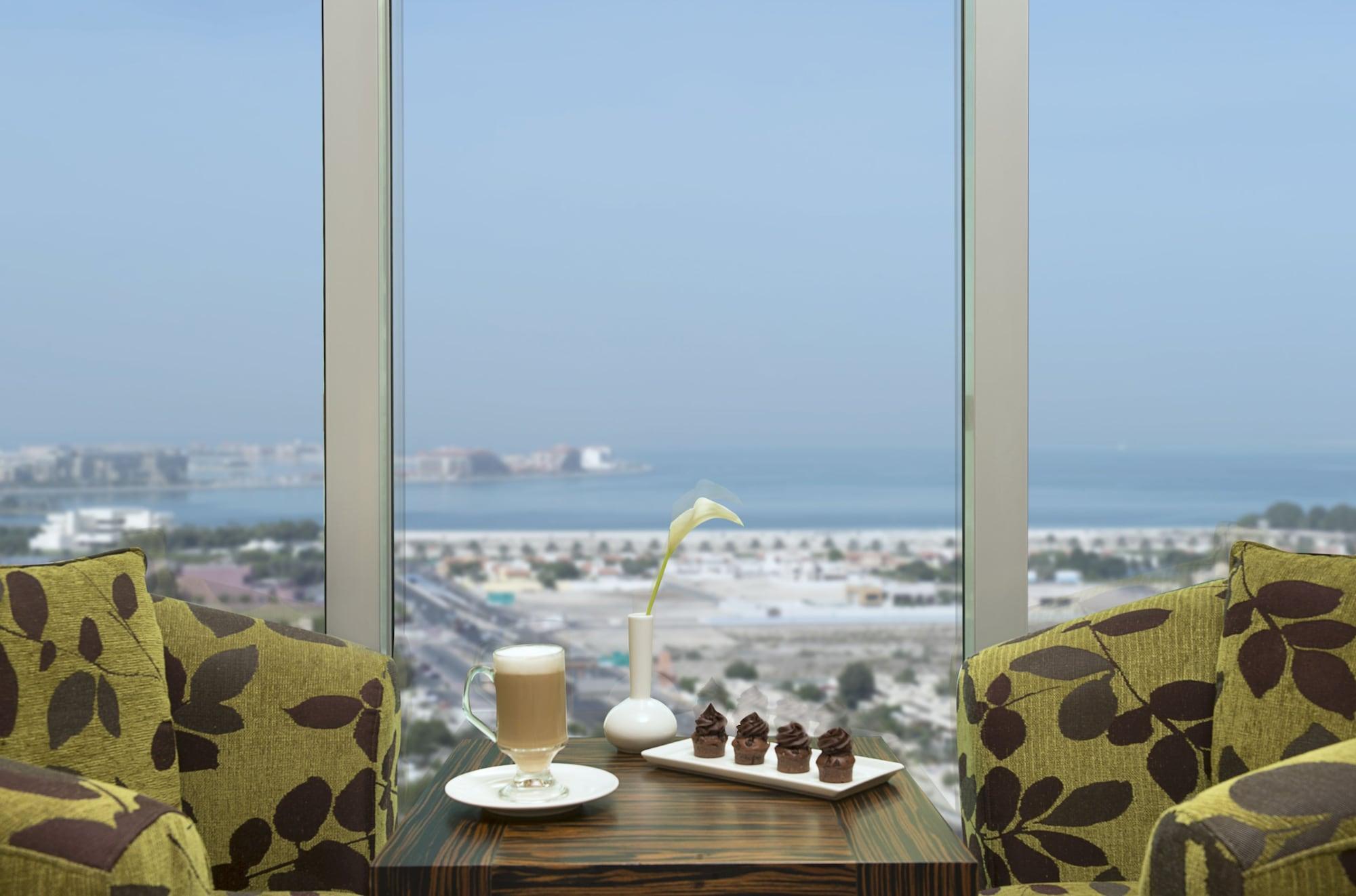 Atana Hotel Dubai Esterno foto A view of the sea from the hotel