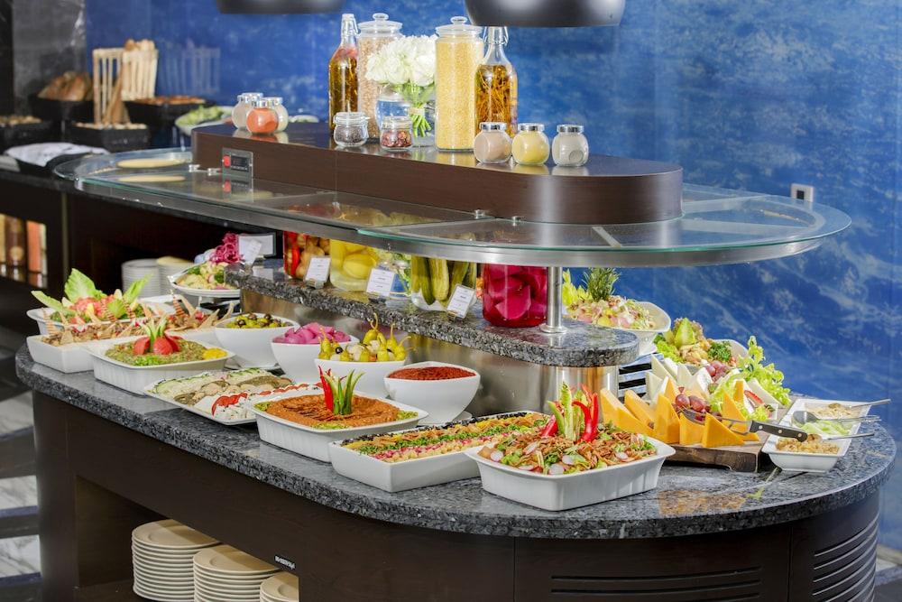 Atana Hotel Dubai Esterno foto Buffet at a luxury hotel