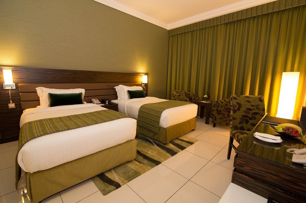 Atana Hotel Dubai Esterno foto A room at the hotel