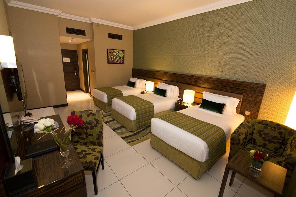 Atana Hotel Dubai Esterno foto A room at the hotel