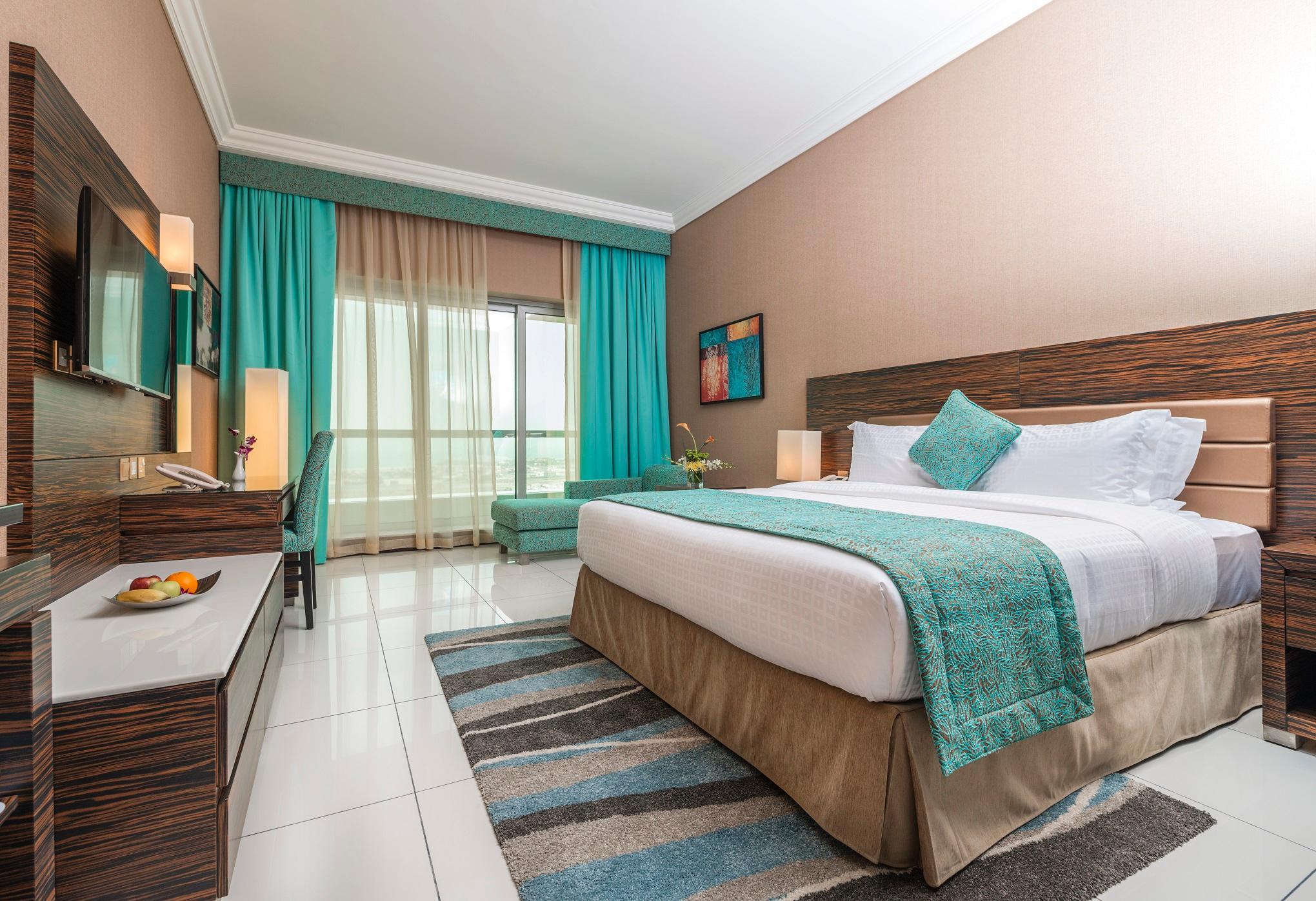 Atana Hotel Dubai Esterno foto A room at the hotel