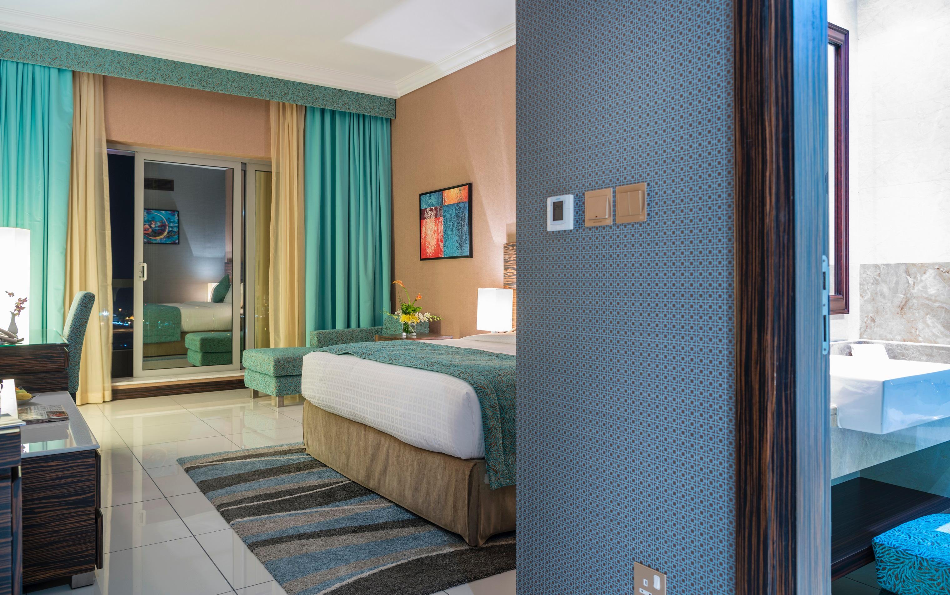 Atana Hotel Dubai Esterno foto A room at the hotel