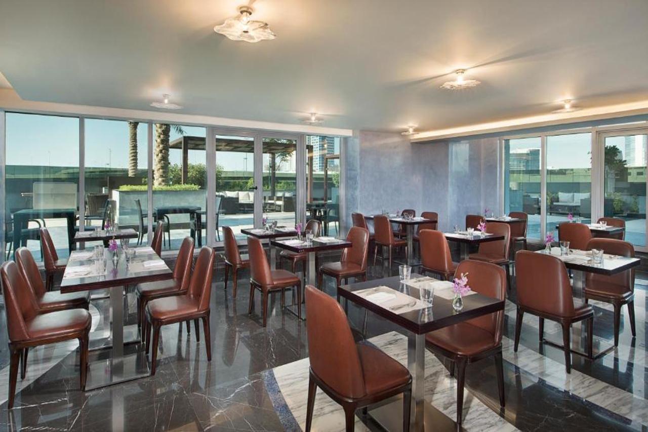 Atana Hotel Dubai Esterno foto The restaurant