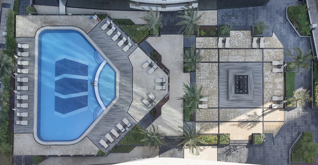 Atana Hotel Dubai Esterno foto Aerial view of the pool